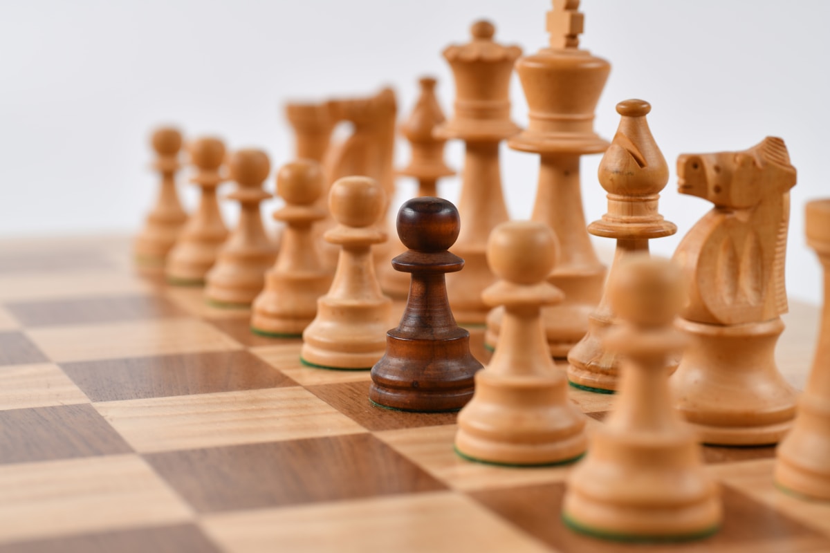 Chess pieces representing strategic thinking in number theory problem solving