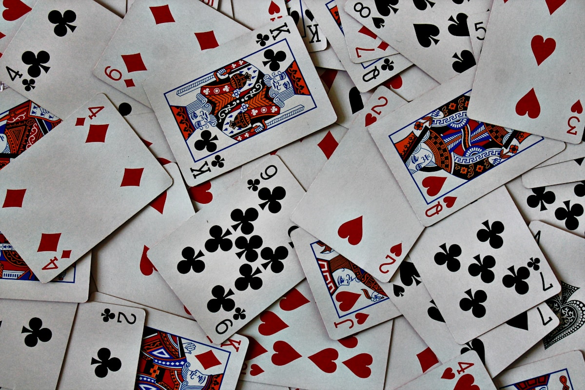 Playing cards representing combinatorial counting and card arrangements in probability problems